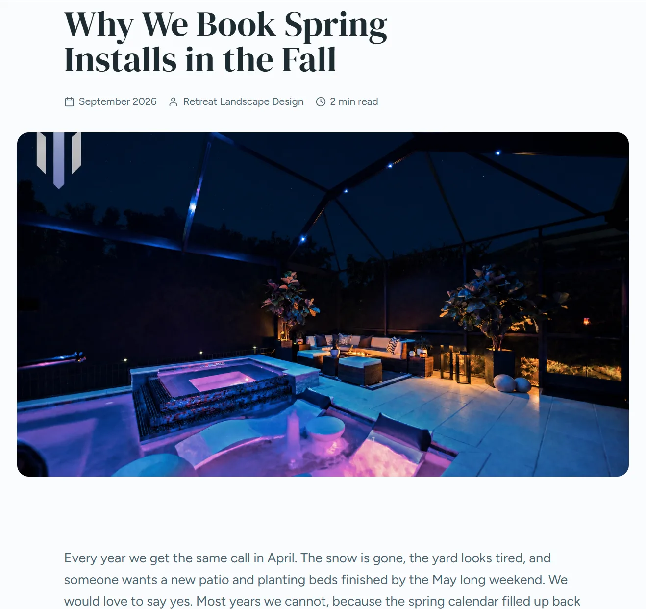 The finished blog post on the demo site, titled why we book spring installs in the fall, with the date, author, a two minute read time and a featured photo.